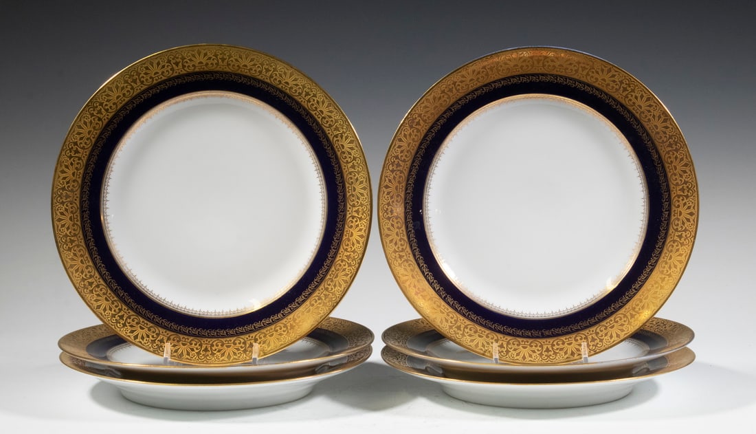 GERMAN PORCELAIN DINNER PLATES: Set of (6) Ca 1900 Plates by Hutschenreuther (Hohenberg, Bavaria), retailed by Ovington Brothers Co., New York, each with inner gilded band, cobalt blue band and textured gilded outer rim, 9 1/2" diam