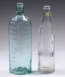 COLLECTIBLE GLASS BOTTLES - COCA COLA & REEVES PATENT: Lot of (2), incl: English early 20th c. Reeves Patent offset neck bottle, embossed "Clarkes Ammonia", having an octagonal shape in aqua glass, 9" high; and Vintage prototype design Coca Cola bottle, i