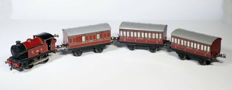 (4 PC) BRITISH TIN LITHO WINDUP TRAIN: (4) pc LMS engine with (3) cars. Has a key; key is inside car. 27" long assembled.