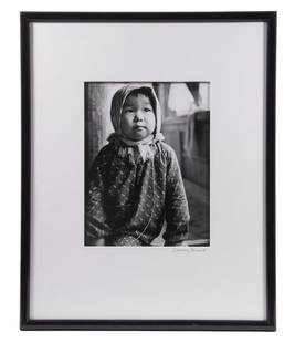 DANNY CONANT (DC, 1930- ): Asian Child, silver gelatin photograph, pencil signed on mat, in a black lacquered wooden frame with mat, glazed, OS: 21" x 17", SS: 11" x 8". Good condition.