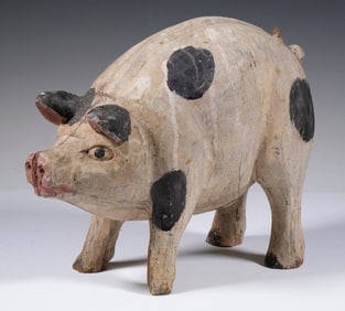 CARVED AND PAINTED PIG SCULPTURE