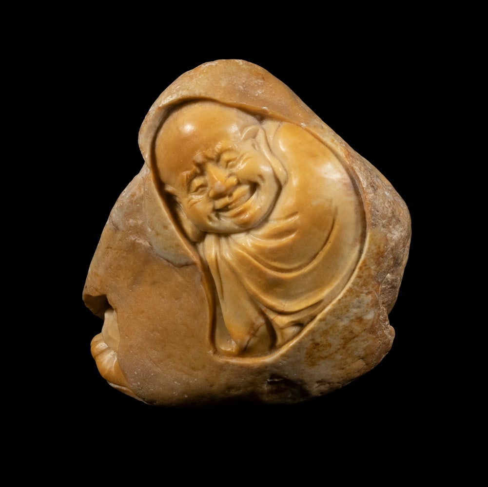 CHINESE YELLOW JADE BUDDHA: CHINESE YELLOW JADE BUDDHASeated Hotei Buddha wrapped in a cloak, 3" tall.