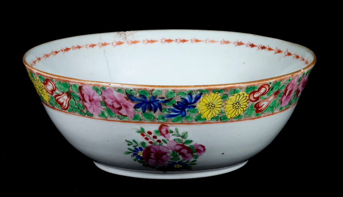 CHINESE EXPORT PUNCH BOWL, 19TH CENTURY: CHINESE EXPORT PUNCH BOWL, 19TH CENTURY Chinese Qing dynasty Famille Rose Porcelain Punch Bowl, with floral decoration, 4 1/8" high, 11 1/4" diam. Hairline cracks, rim chips, foot chips.
