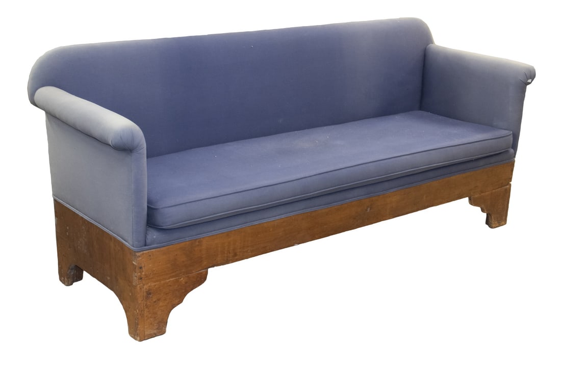 COUNTRY PINE SOFA: COUNTRY PINE SOFABlue Fabric Upholstered Couch, with outswept arms, removable seat cushion with self-cording, primitive boarded pine base, 33" high, 76" x 24 3/4", 17 1/2" high seat. Soiled and discol