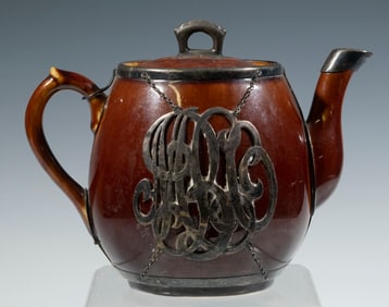 SILVER MOUNTED CERAMIC TEAPOT