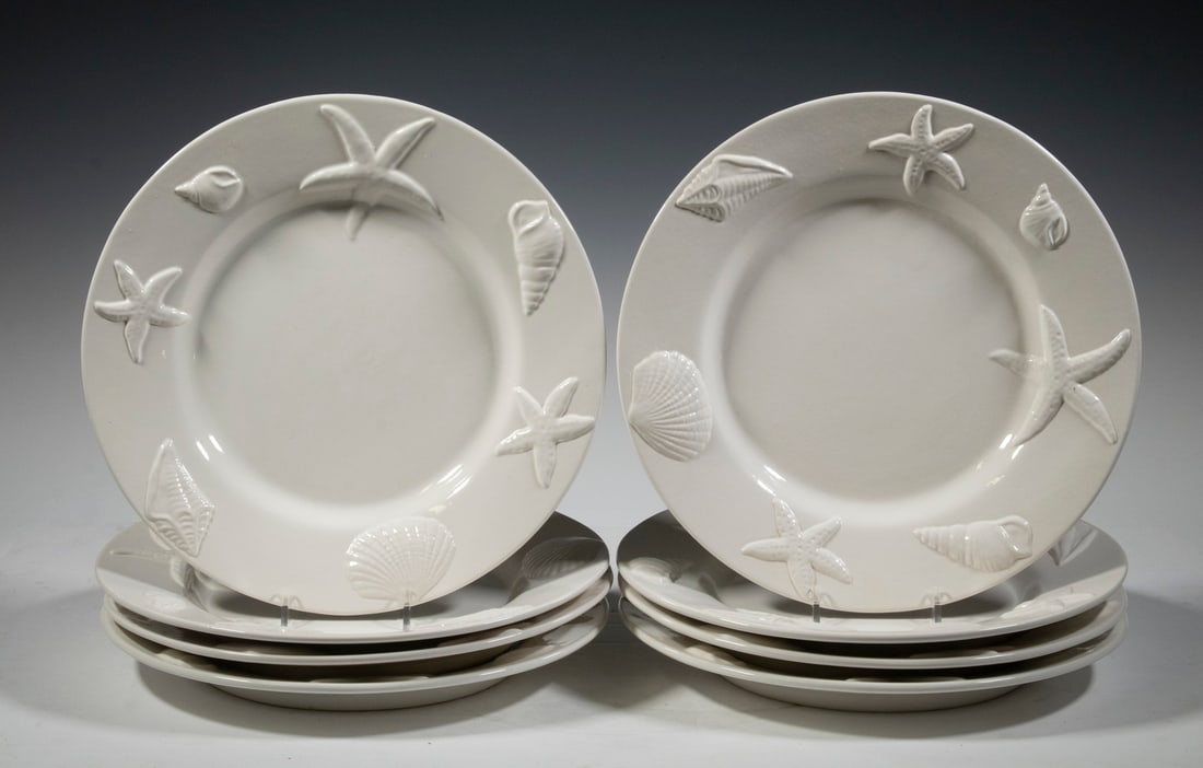 (8) POTTERY BARN SEASHORE RIM PLATES: (8) POTTERY BARN SEASHORE RIM PLATESSet of (8) Pottery Barn White "Seashore Rim" Dinner Plates, rims with embossed shells and starfish, microwave and dishwasher safe, 11 1/4" diam. Good condition.