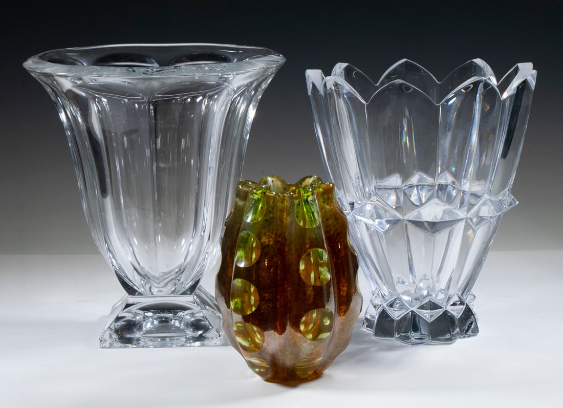 (3) ART GLASS VASES: (3) ART GLASS VASESIncluding: Evolution by Waterford vase, in green to gold iridescent glass, lobed ovoid shape with ruffled rim, with original affixed foil label, 7" high, 4 1/2" diam.; and (2) Heavy