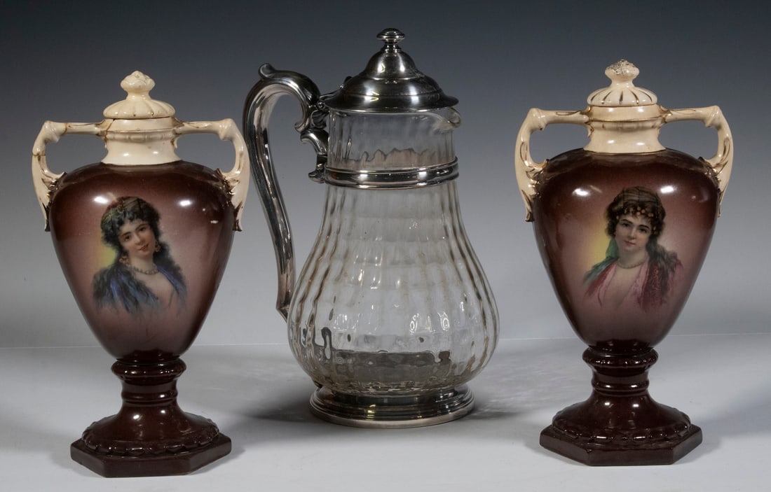 PR BOHEMIAN VASES & GLASS EWER: PR BOHEMIAN VASES & GLASS EWER(3) Piece Lot, incl: Pair of 19th c. Bohemian pottery lidded vases, with side handles, each with image of a young beauty on one side, on hexagonal bases, 9 1/2" high, one