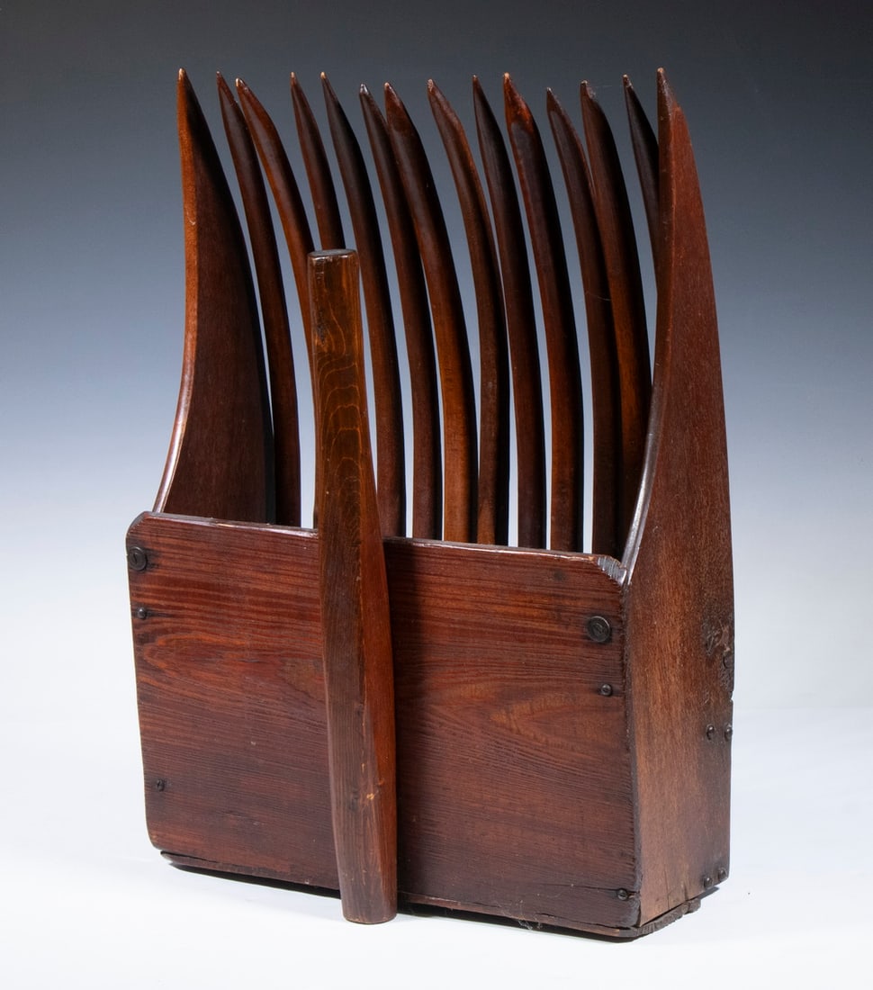 WOODEN CRANBERRY BOG RAKE: WOODEN CRANBERRY BOG RAKE 19th c. Harvesting Scoop, with curved wooden tines, cylindrical handle. OS: 19 1/2 x 13 1/4 x 7 in. (49.5 x 33.7 x 17.8 cm.)