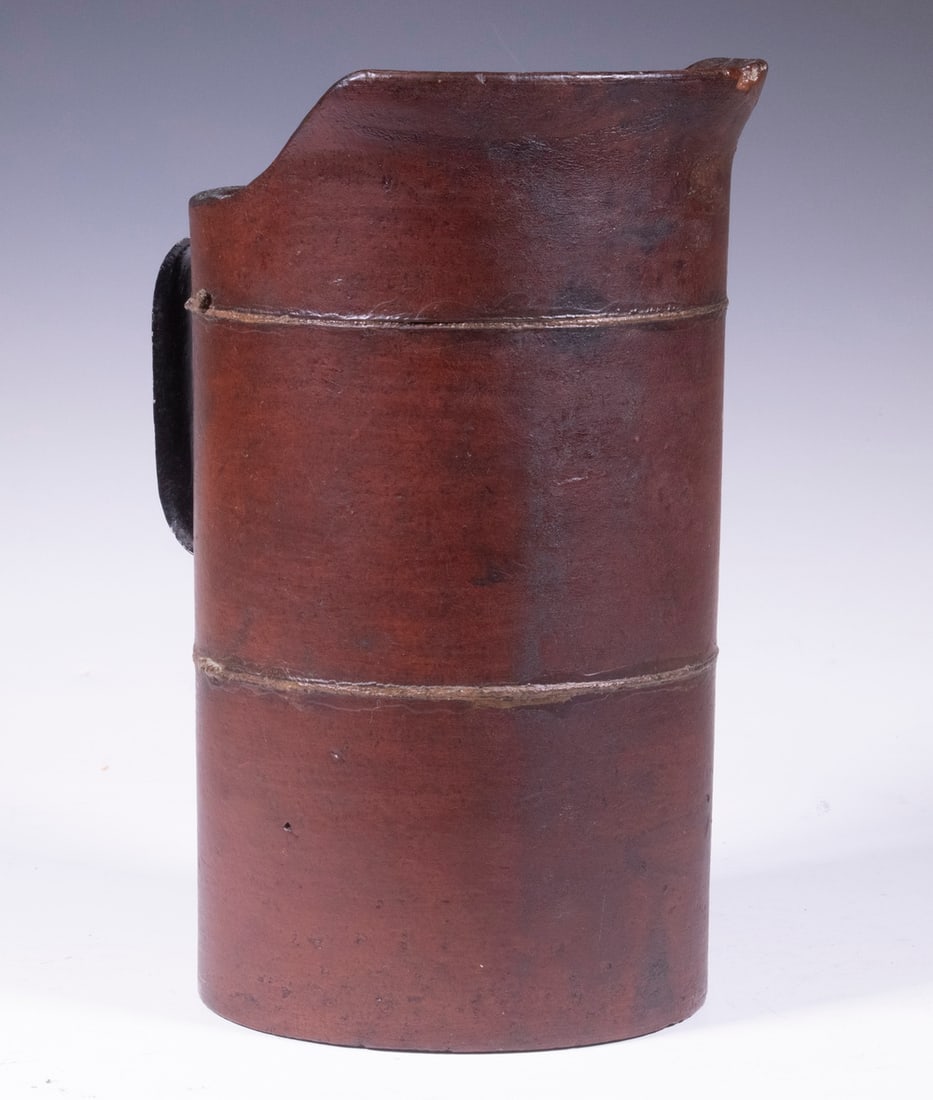 1880'S PAINTED WOOD FIBRE PITCHER: 1880'S PAINTED WOOD FIBRE PITCHER Durable Water Pitcher of fibre composition in original deep red finish with black metal handle and wire binding, marked on the underside "United Indurated Fibre Co.,