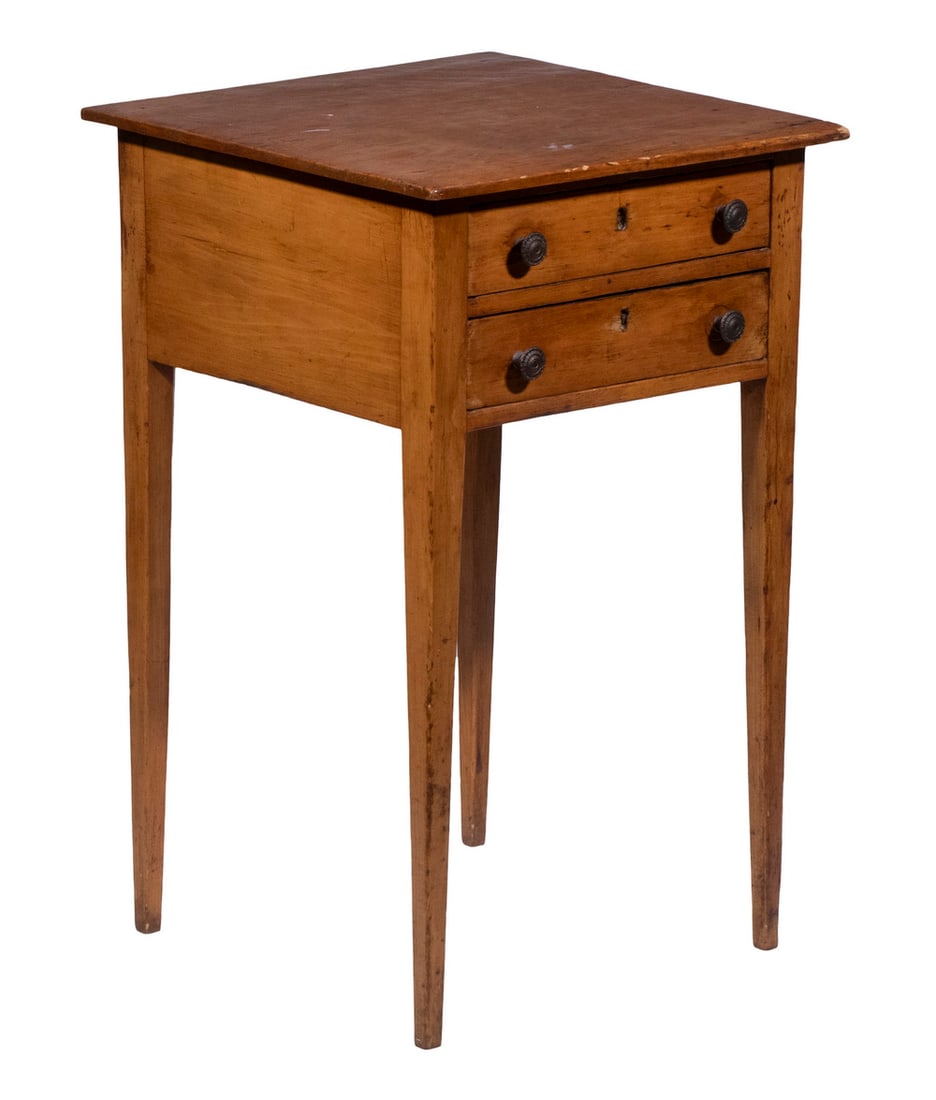 COUNTRY HEPPLEWHITE STAND: COUNTRY HEPPLEWHITE STANDEarly 19th c. Cherry Two-Drawer Stand, with brass pulls, set on square tapered legs. Top crack with repair.OS: 28 1/2 x 18 1/2 x 18 1/2 in. (72.4 x 47 x 47 cm.)