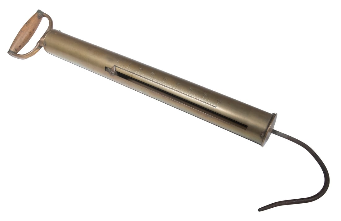 BRASS SPRING BALANCE FISH SCALE: BRASS SPRING BALANCE FISH SCALE Vintage Tubular Design Hanging Scale, for weighing fish and game, 40-lb capacity, with wooden handle and iron hook. OS: 22 x 1 3/4 x 1 3/4 in. (55.9 x 4.4 x 4.4 cm.)