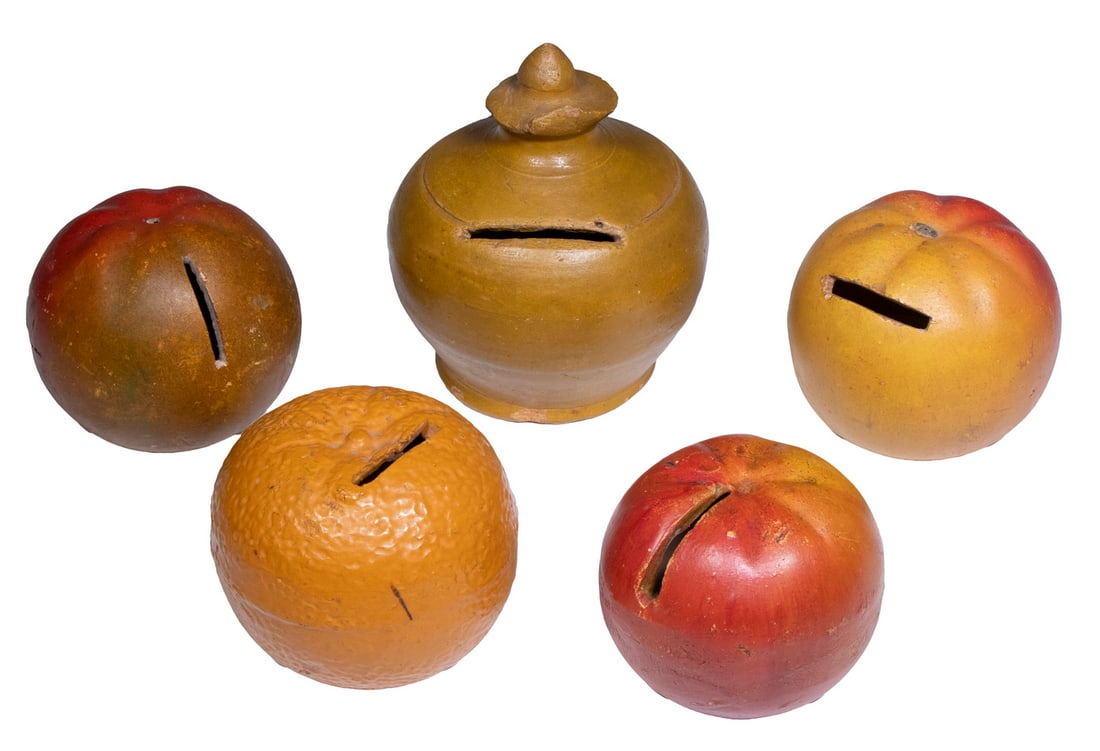 (5) POTTERY FRUIT BANKS: (5) POTTERY FRUIT BANKS Collection of (5) Late 19th - Early 20th c. Still Banks: (3) molded in the form of apples, 3" high; (1) in the form of an orange, 3 1/2" high; and (1) rounded with top finial,