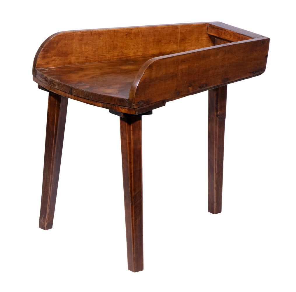 PINE SIDE TABLE: PINE SIDE TABLE Primitive Three-Legged Low Table, with curved front, raised back and side panels. Refinished. OS: 24 1/2 x 19 x 27 in. (62.2 x 48.3 x 68.6 cm.)