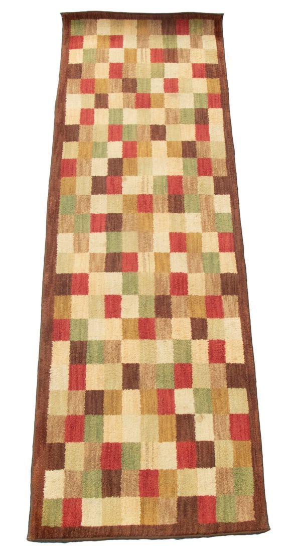 KARASTAN RUNNER (2' 6" x 8'): KARASTAN RUNNER (2' 6" x 8') A "Maya-Plum" pattern with checker board design in shades of tan, red, plum and gold with no border. Good pile with some stains. OS: 30 x 96 in. (76.2 x 243.8 cm.)