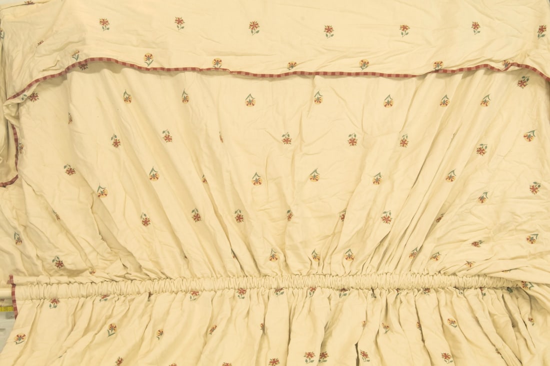 SET OF LINED COTTON DAYBED DRAPES WITH RODS: SET OF LINED COTTON DAYBED DRAPES WITH RODS Canopy consisting of gathered back panel, top and valances, in cream cotton with scattered strawflower pattern, red and plum checked border, mounted on
