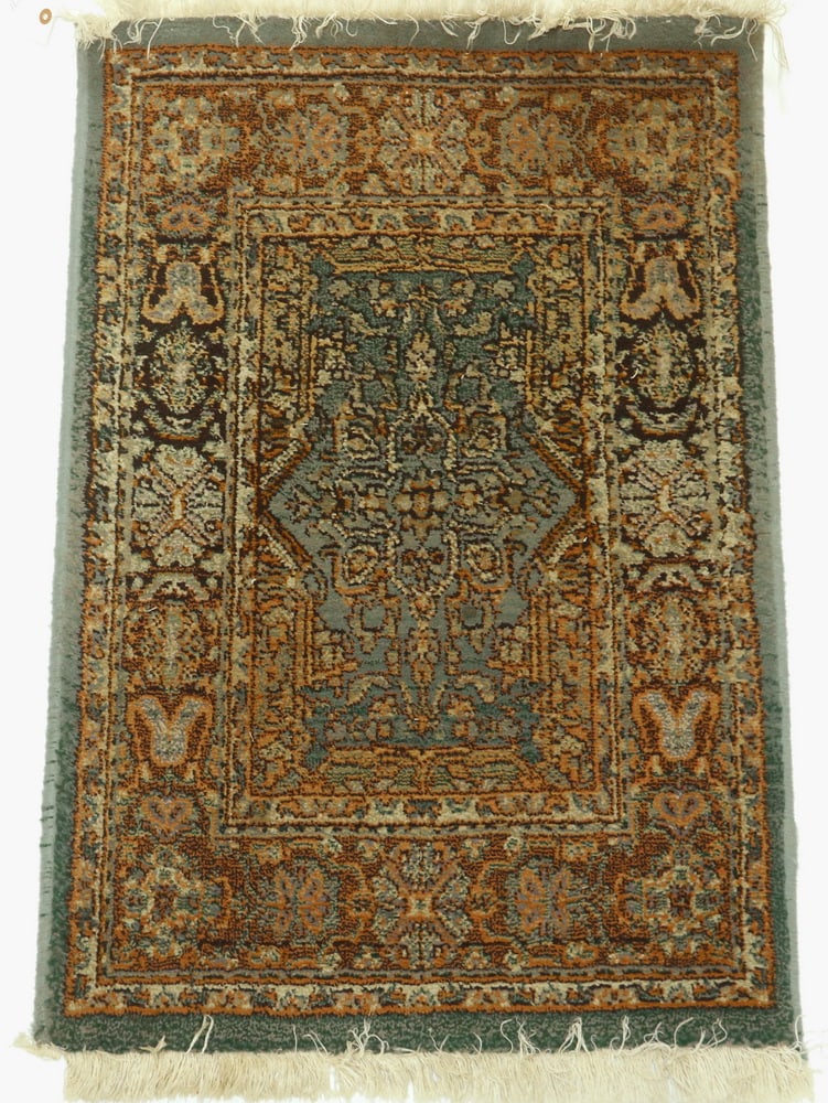 EGYPTIAN MACHINE WOVEN MAT: EGYPTIAN MACHINE WOVEN MAT (2' x 3') Overall gray center with navy blue palmette border, olefin pile. Good condition, needs cleaning. 24 x 36 in. (61 x 91.4 cm.)