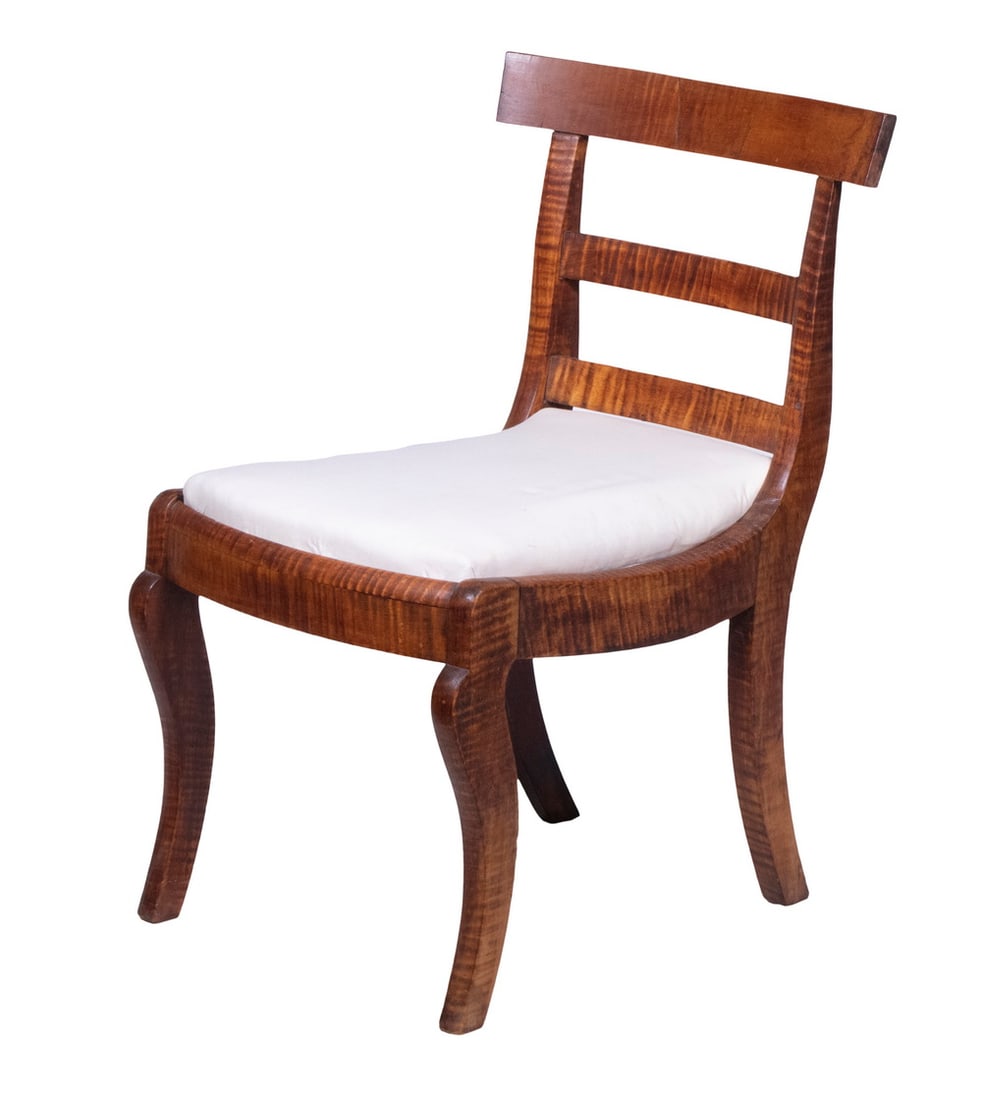 TIGER MAPLE SIDE CHAIR: TIGER MAPLE SIDE CHAIR 19th c. American Chair, with curved crest, two-slat back, drop in seat, set on saber legs. 17 1/2" high seat. OS: 30 x 20 x 23 in. (76.2 x 50.8 x 58.4 cm.)