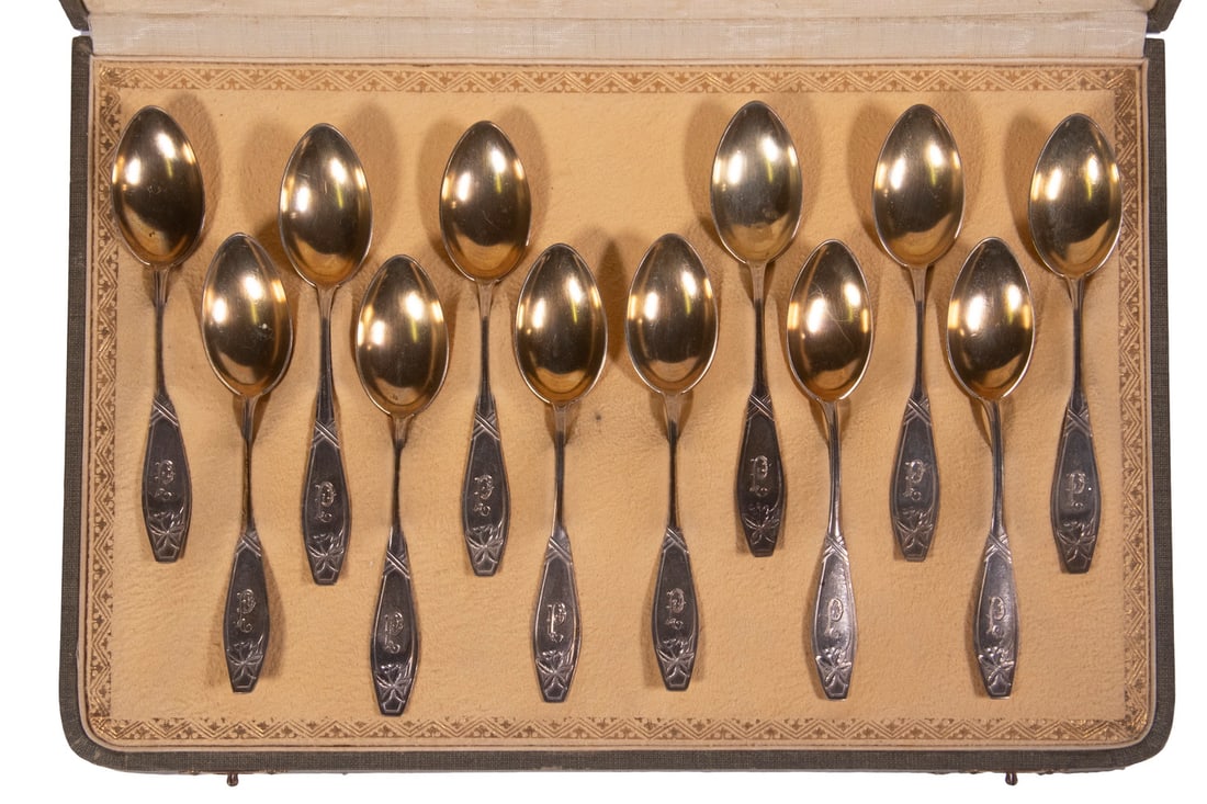 CASED WILHELM GIESE SILVER DEMITASSE SPOON SET: CASED WILHELM GIESE SILVER DEMITASSE SPOON SET (12) Early 20th c. German 800-Silver Spoons, with gilt-washed bowls, by Wilhelm Giese of Hamburg, each with P monogram, in a presentation case marked