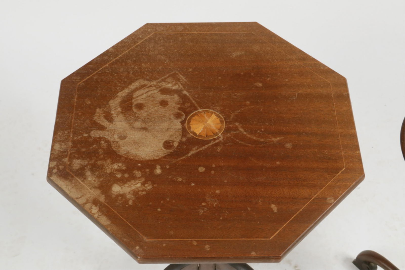 (2) LAMP STANDS: (2) LAMP STANDS 20th c. Replica Lamp Stands, one six-sided top having inlaid pinwheel and stringing, with turned urn pedestal set on flat arched legs, 27 1/2" x 17", stained; the other with small