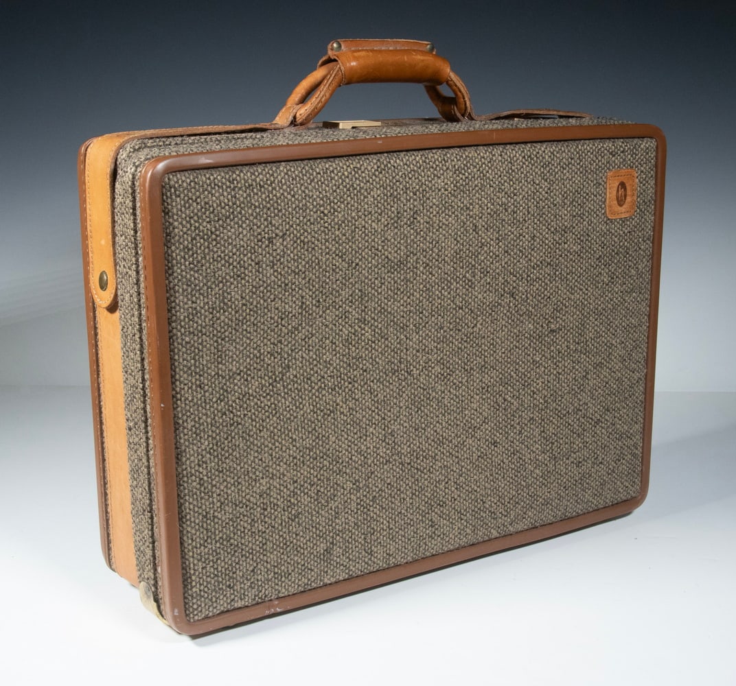 HARTMANN LUGGAGE TWEED & LEATHER ATTACHE CASE: HARTMANN LUGGAGE TWEED & LEATHER ATTACHE CASE Vintage Briefcase, with flexible wood frame, tweed fabric side and industrial belting leather trim, Dial-O-Matic combination lock, interior fitted with