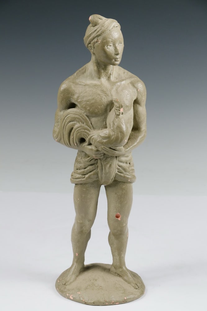 FRED PRESS SCULPTURE: FRED PRESS SCULPTURE Painted plaster depicting Indian holding rooster by ?Fred Press?. Rooster's beak is missing, hole in left leg. Height: 12 in. (30.5 cm.)