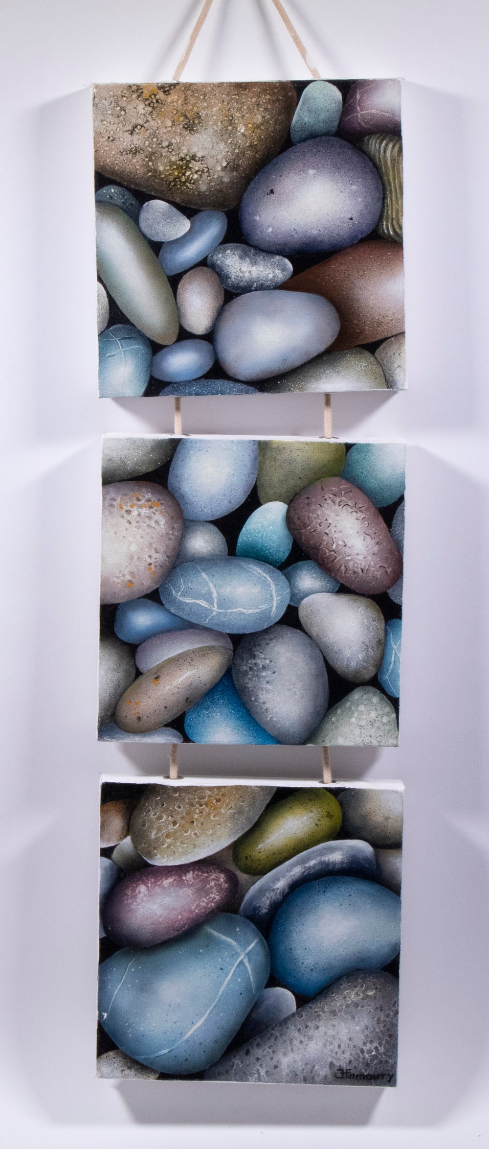 JEAN-FRANCOIS HAMOURY (FRANCE, CONTEMPORARY): JEAN-FRANCOIS HAMOURY (FRANCE, CONTEMPORARY) Triptych of Stones, oil on canvas, signed lower right on bottom panel, artist label affixed verso, three square canvases connected by rope, with painted