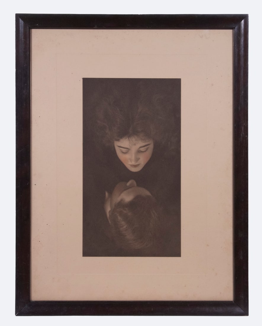 1900S SENTIMENTAL PRINT, FRAMED, UNSIGNED: 1900s SENTIMENTAL PRINT, FRAMED, UNSIGNED Entranced, a man and woman drawing together viewed from above, chromo litho, in mahogany ogee frame, good condition. OS: 22 x 17 in. (55.9 x 43.2 cm.)