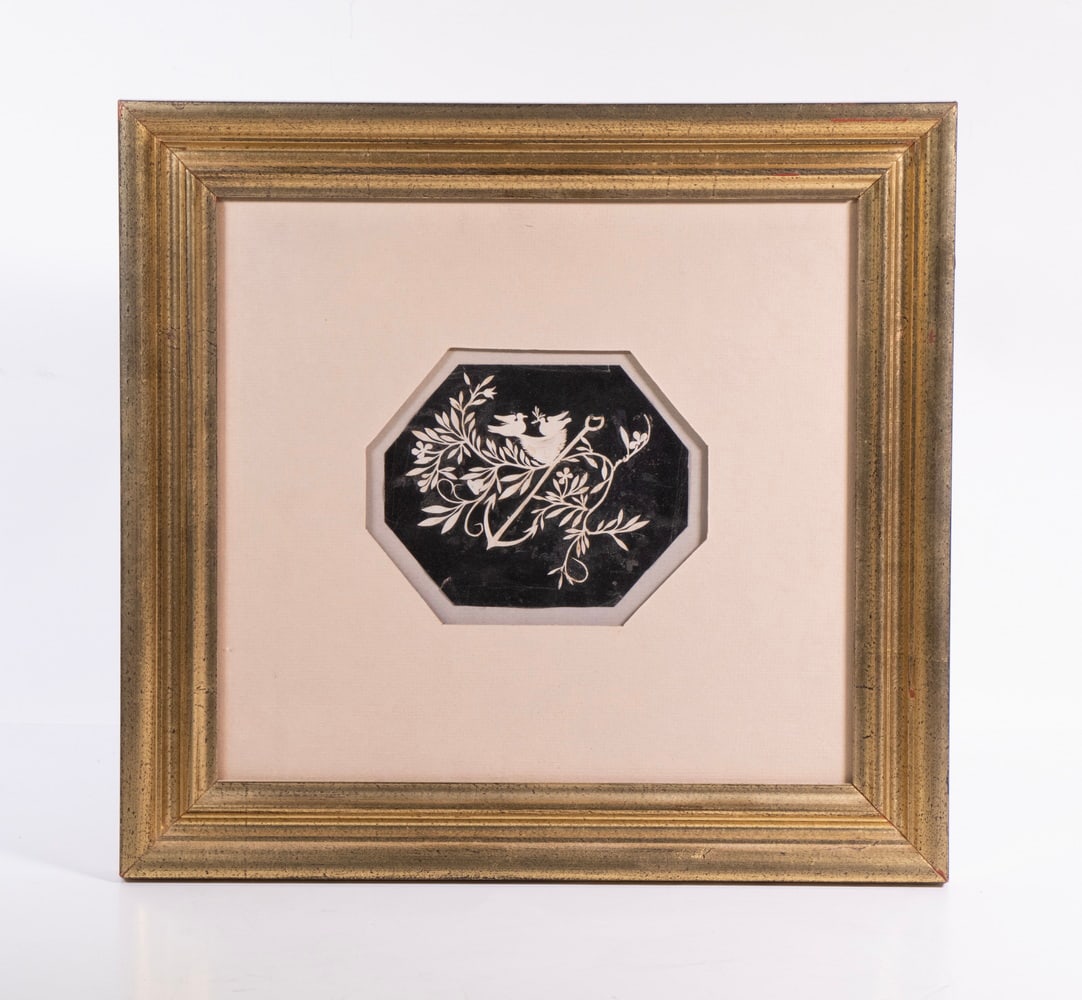 19TH C. SAILOR'S MEMORIUM PAPER CUTWORK, FRAMED: 19TH C. SAILOR'S MEMORIUM PAPER CUTWORK, FRAMED Octagonal black on white paper cutting featuring winterberries, an anchor, and a pair of doves, in modern lemon gold rectangular frame, under