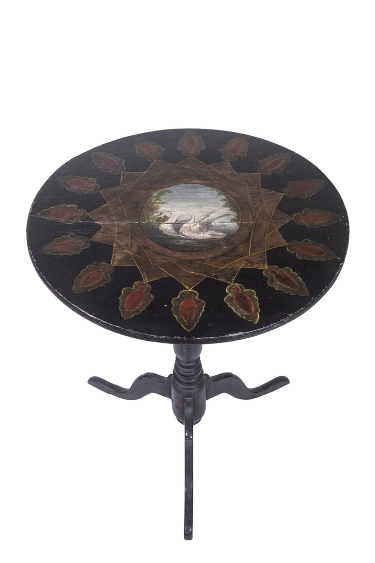 PAINTED QUEEN ANNE CANDLESTAND: PAINTED QUEEN ANNE CANDLESTAND Vintage Round Country Side Table, having a black surface and top decorated with swans surrounded by a tasseled medallion, set on a turned pedestal and tripod base with c