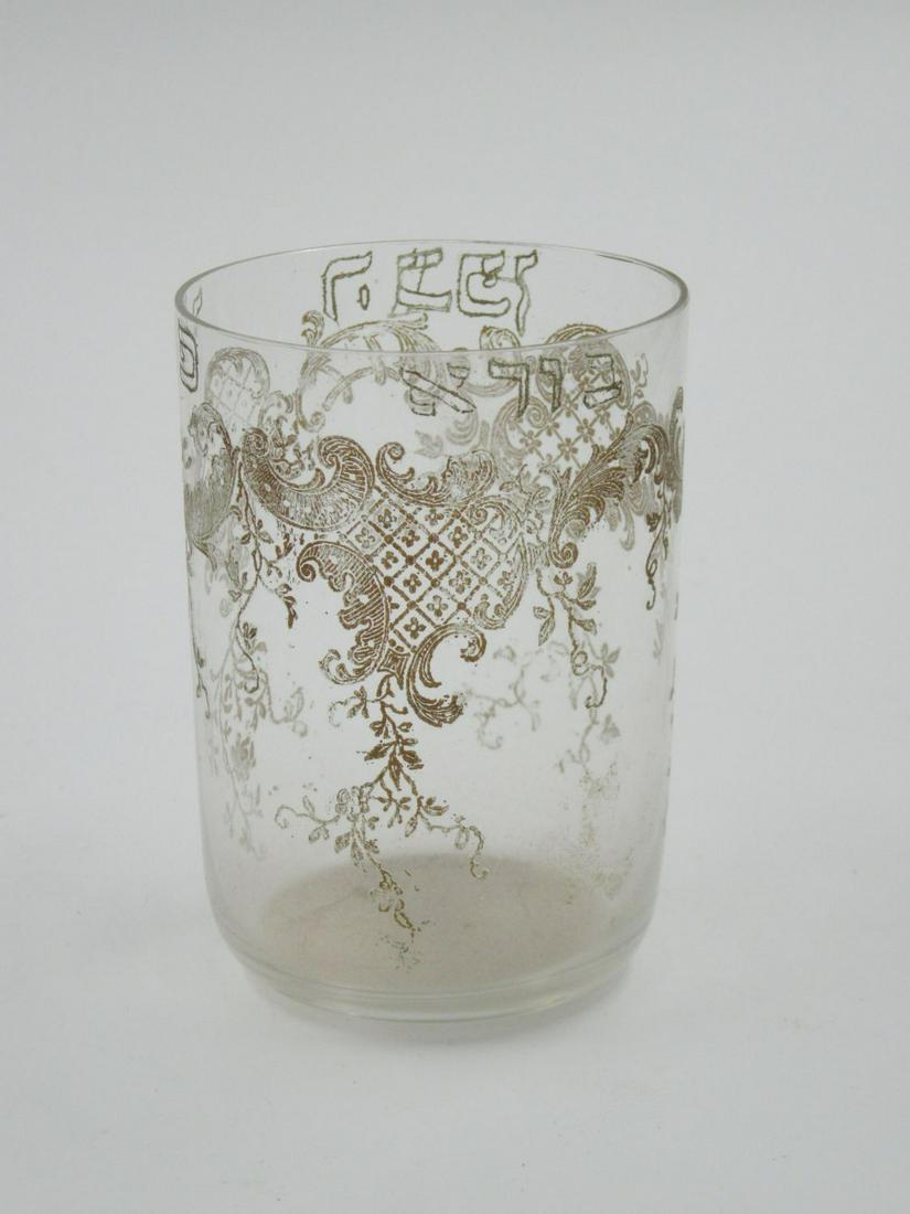 Glass Kiddush goblet. Europe.: Judaica. Engraved. Thin glass. Inscribed "Borei pri ha-gefen" Height: 9 cm