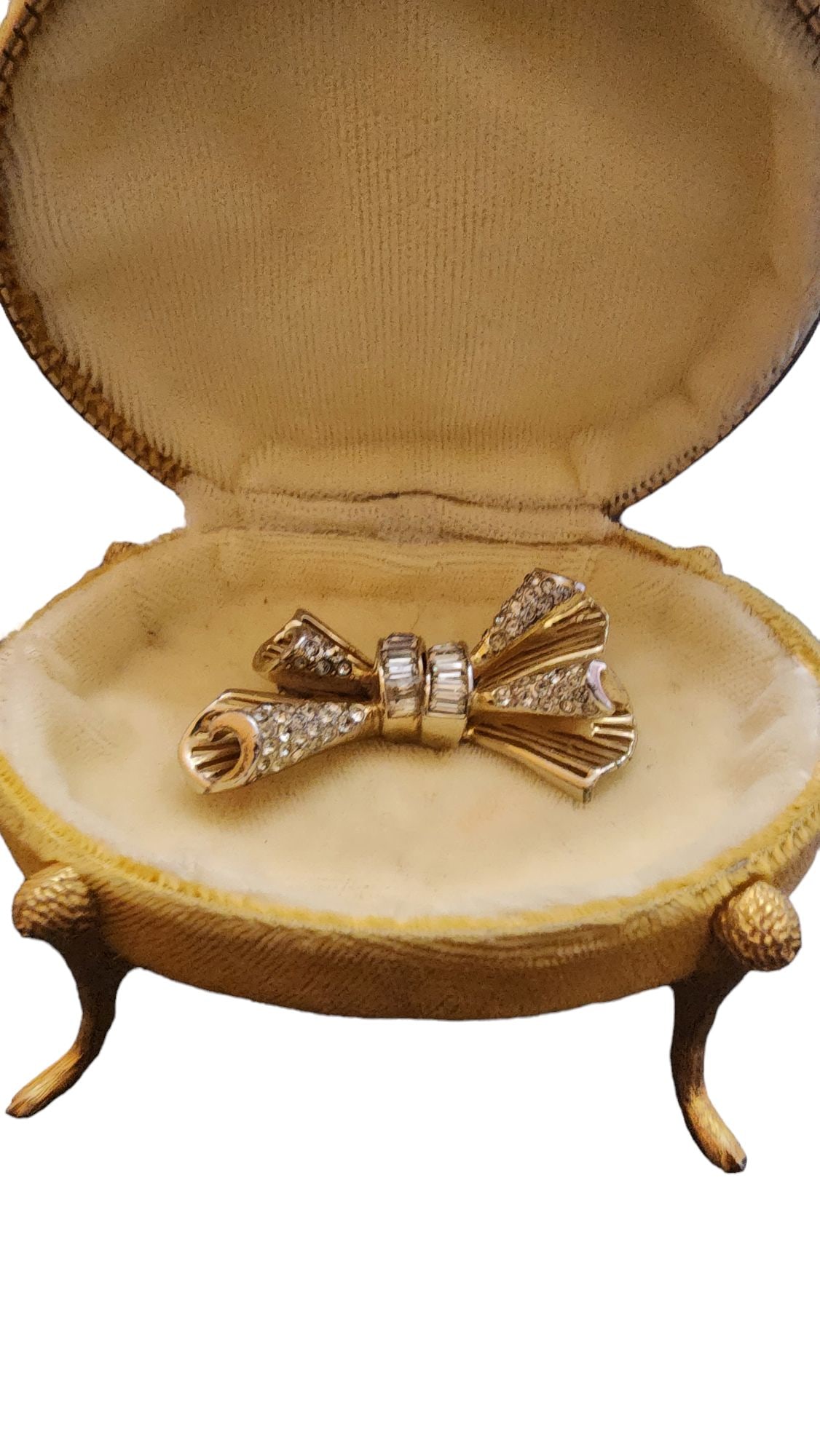 Vintage Signed Coro Craft Sterling Bow Brooch: Size: 2.25".Color: Gold, Clear.Condition: Very good vintageSigned: Coro CraftDetails: beautiful stones, detailing, and plating over the sterling. WE OFFER IN-HOUSE SHIPPING AS WELL AS LIVE SHIPPING !!