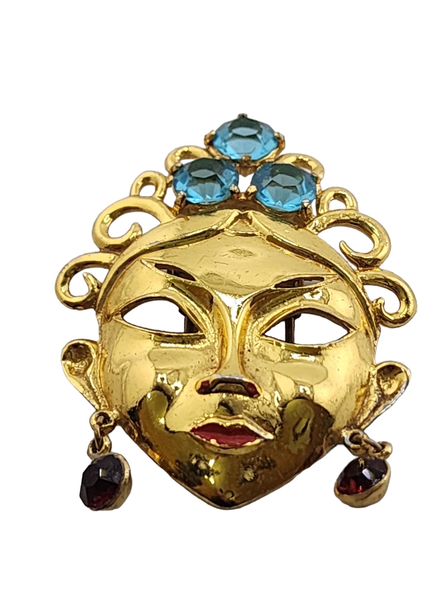 Vintage Unsigned Lady Face Mask Fur Clip: Size: 2.25" Color: Gold, Blue Condition: Very good vintage Signed: None Details: Possibly attributed to Mazer, but could not confirm. Plating is exceptional.