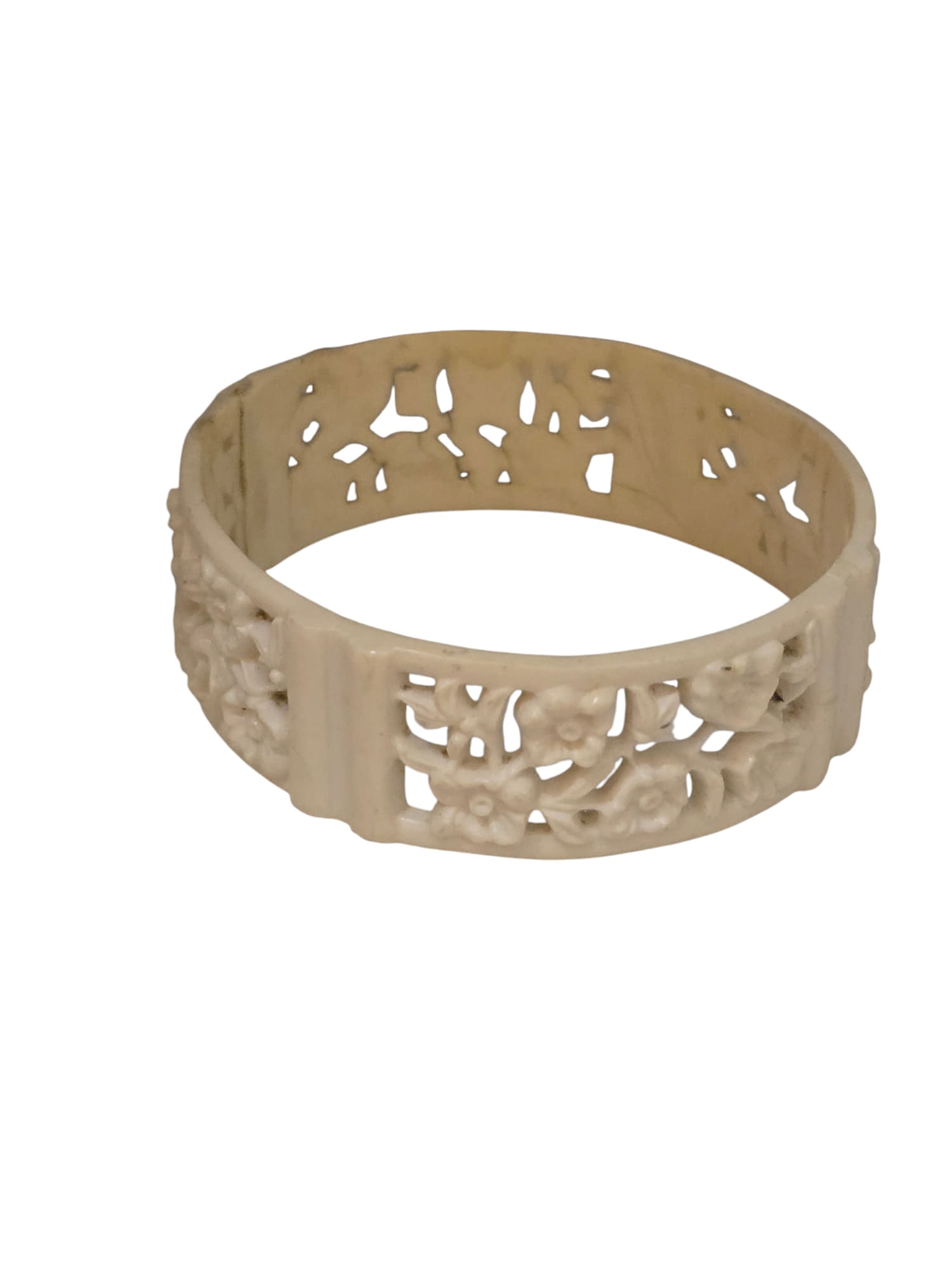 VINTAGE CELLULOID/ EARLY PLASTIC PIERCED BANGLE: IT ALMOST LOOKS LIKE IT'S HINGED ON 1 SIDE. IT DOESN'T MOVE, SO NOT REALLY SURE. ALMOST 1" WIDE BY 2.5" INNER DIAMETER.
