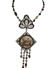 VINTAGE PORCELAIN FRAGONARD PENDANT ON ASSORTED GLASS NECKLACE