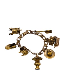 VINTAGE BRASS ANTIQUE CHARM BRACELET WITH UNIQUE CHARMS