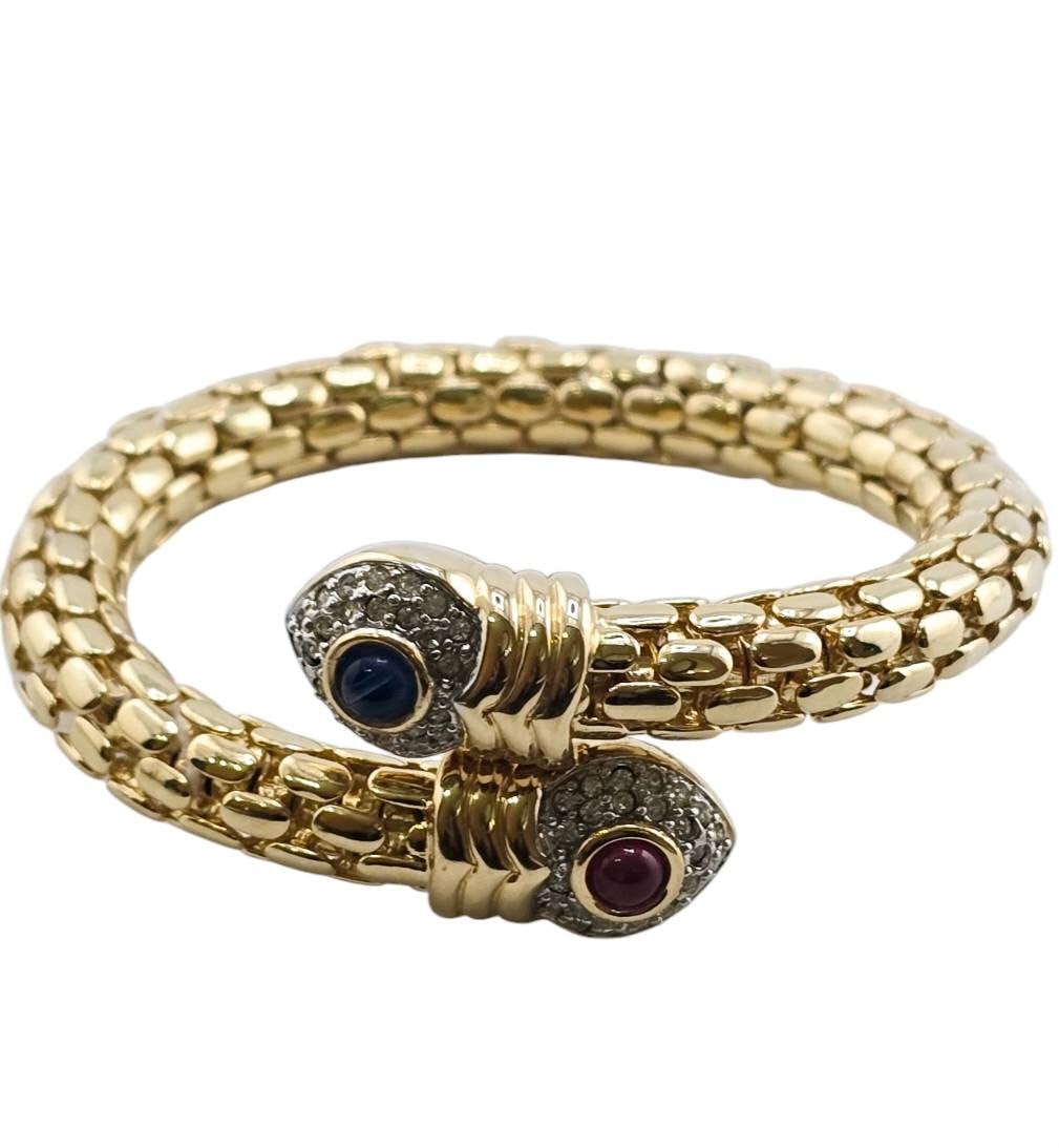 VINTAGE 80S MOGUL RHINESTONE ADJUSTABLE BRACELET: VINTAGE 80S MOGUL RHINESTONE ADJUSTABLE BRACELET, FABULOUS BRACELET, UNSIGNED, DESIGNER QUALITY AND WEIGHT, IT'S PRETTY HEAVY, GREAT PLATING, ALL GLASS. WE OFFER IN-HOUSE SHIPPING AS WELL AS LIVE SHIP
