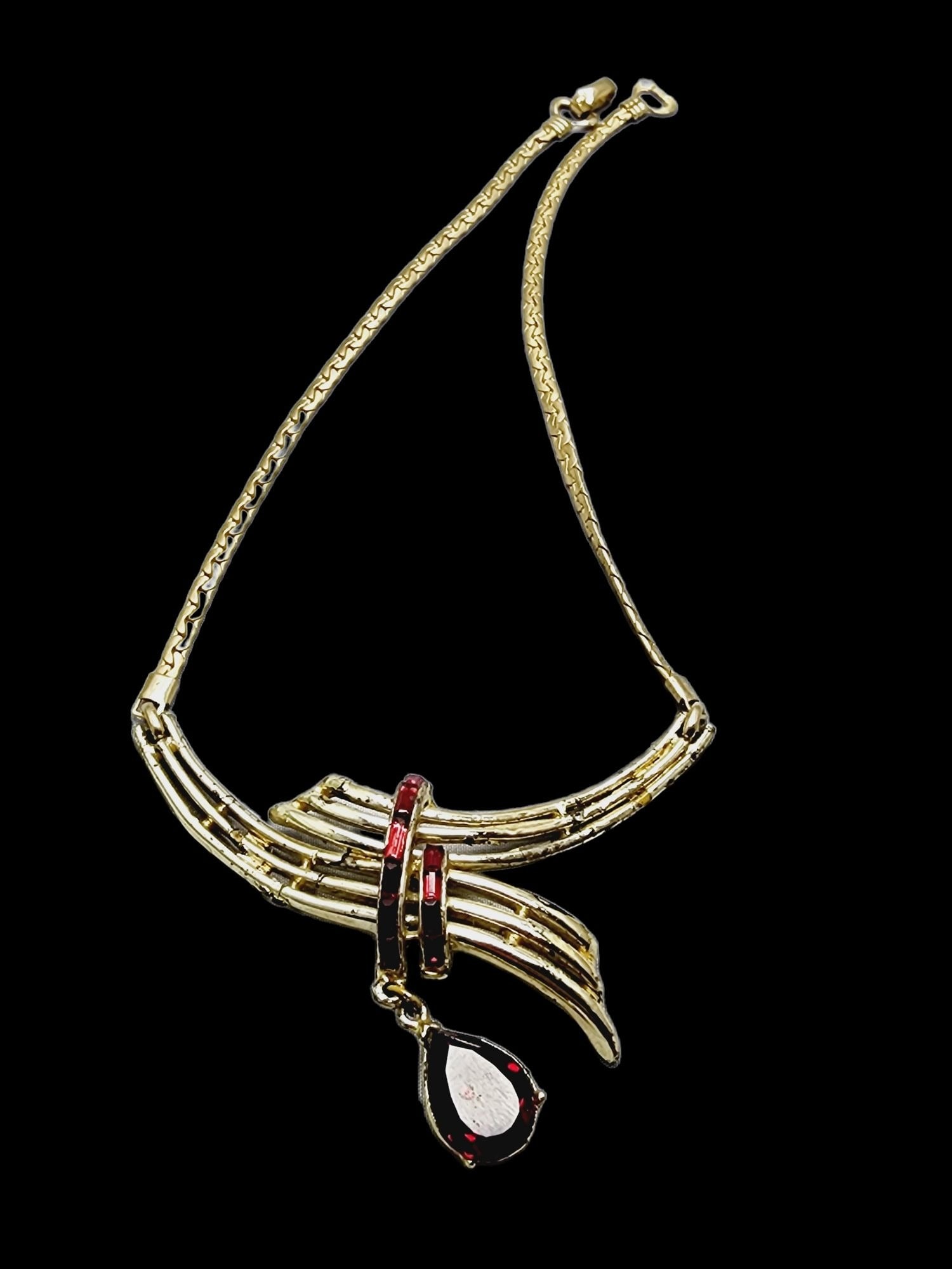 VINTAGE SIGNED CORO TEARDROP NECKLACE: Vintage Signed Coro Teardrop NecklaceBeautiful coro vintage necklace made from gold-plated metal with red teardrop focal glass stone. Very detailed and beautiful. Signed on clasp. Unfortunately, there