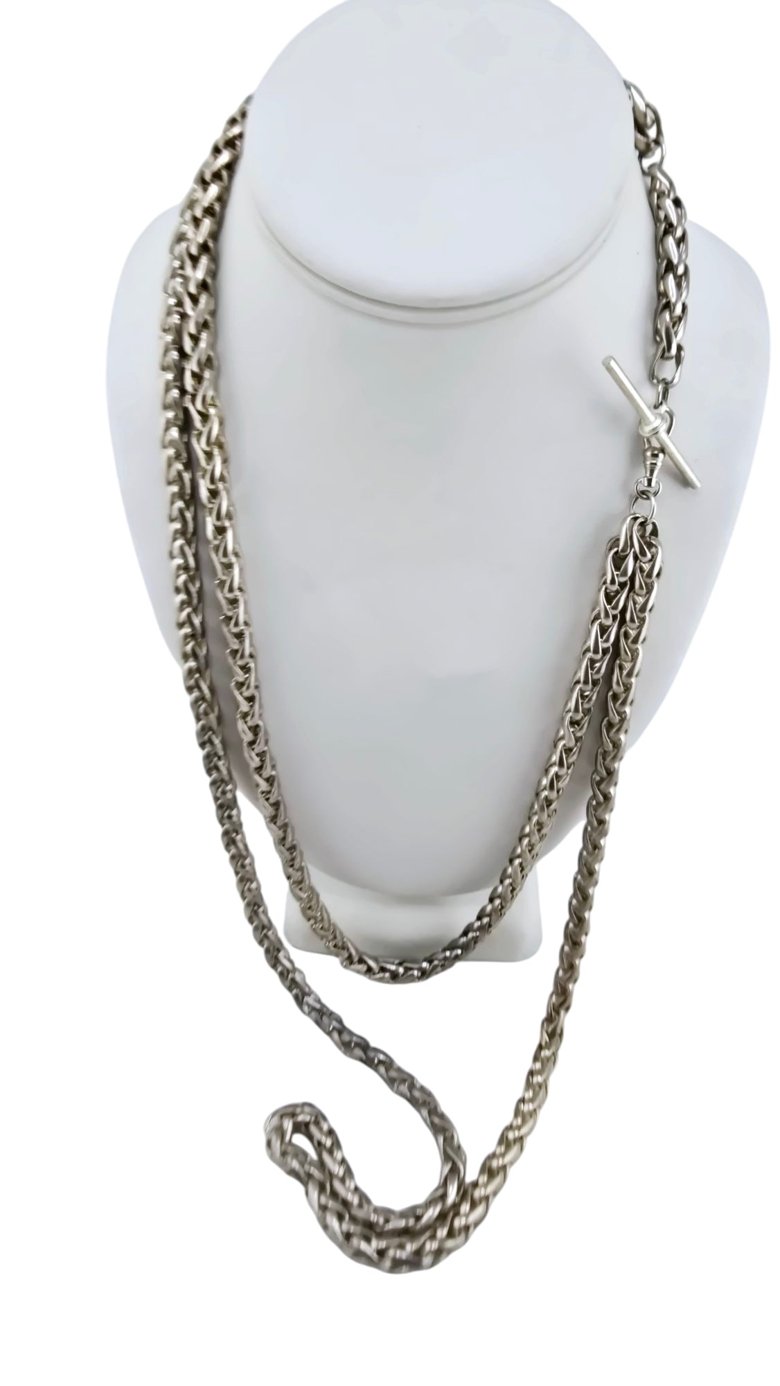 VINTAGE HEAVY UNIQUE SILVERTONE CHAIN NECKLACE WITH UNIQUE CLOSURE: VINTAGE HEAVY UNIQUE SILVERTONE CHAIN NECKLACE WITH UNIQUE CLOSURE, 22" TO 34". HAS A WATCH FOB CLOSURE AND TOGGLE. THE TOGGLE LOOKS LIKE ITS JUST A DECORATIVE PIECE AND THERE ARE SOME TARNISHING TO C