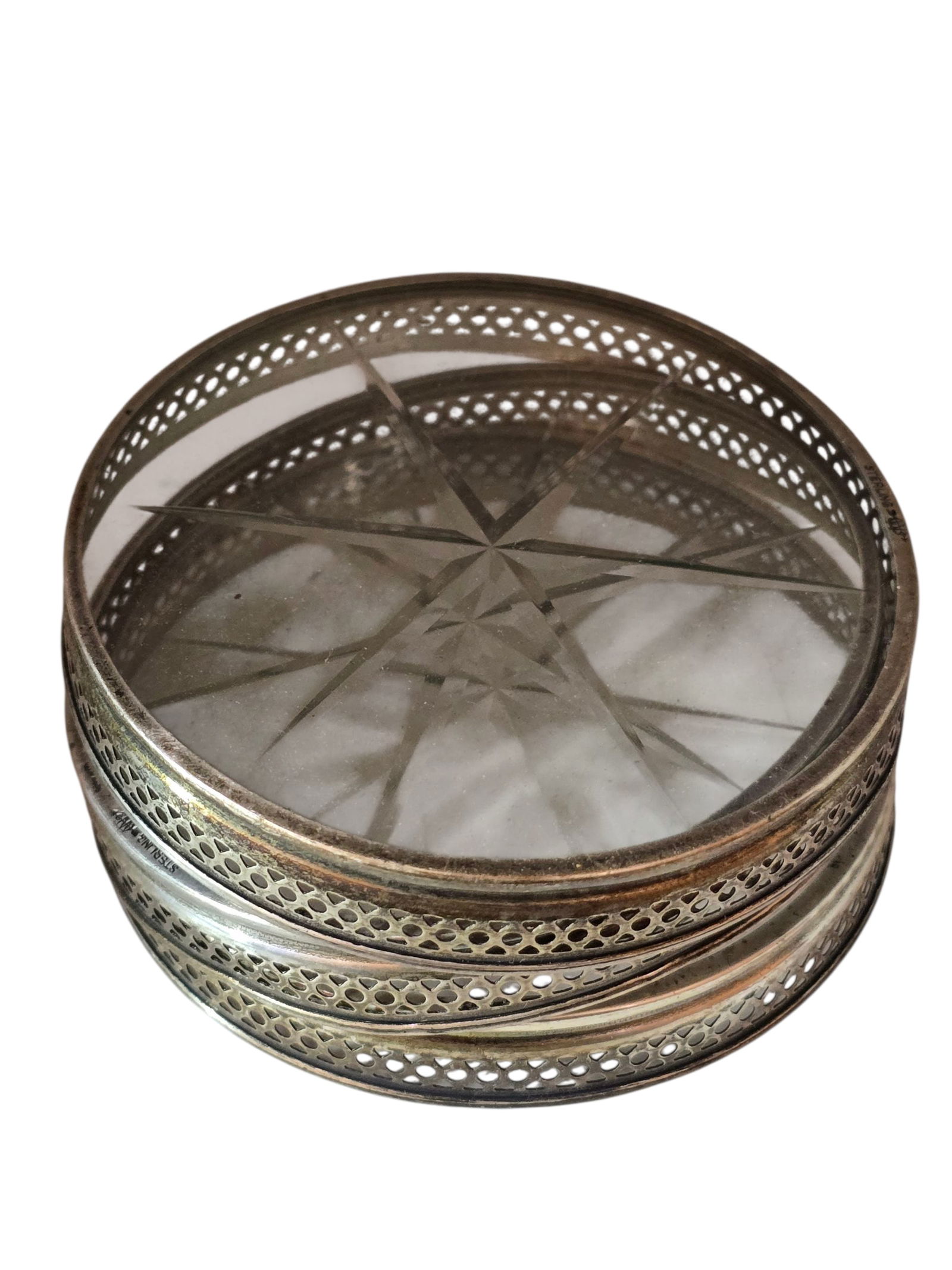 VINTAGE SET OF 3 PIERCED AND STAR GLASS COASTERS: VINTAGE SET OF 3 PIERCED AND STAR GLASS COASTERS. 3", NICE DESIGN. ALL MARKED STERLING.