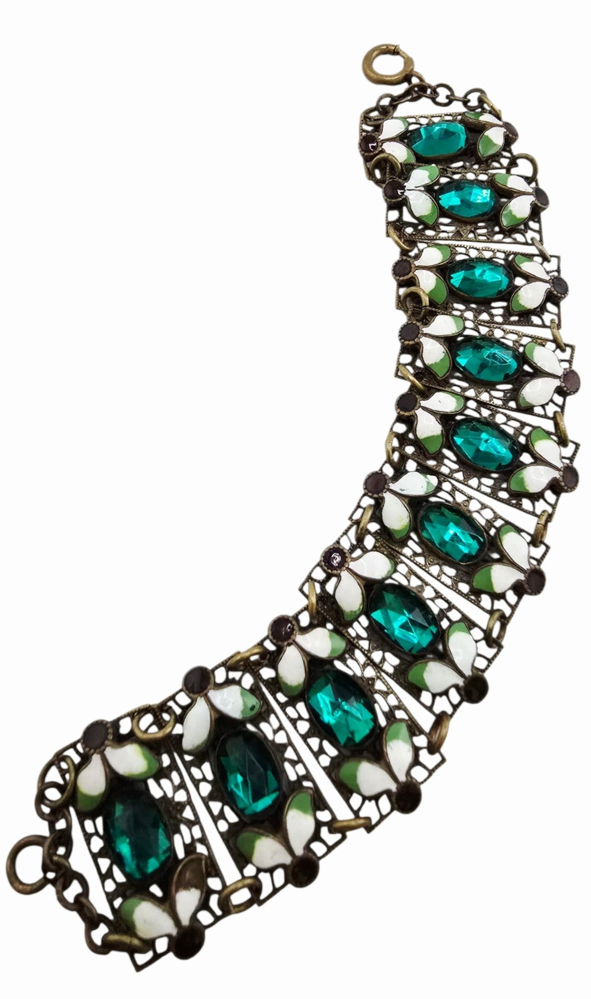 ART DECO CZECH GLASS AND ENAMEL LEAF BRASS BRACELET: Art deco Czech glass and enamel leaf brass bracelet. In very nice condition, * I only see 1 flaw on a leaf at 1 end of the bracelet, it is missing half the enamel on the leaf.* All the stones are glas
