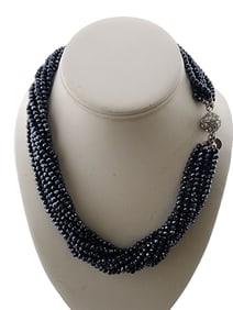 VINTAGE MULTI STRAND CRYSTAL NECKLACE SIGNED SAACHI WITH MAGNETIC CLOSURE