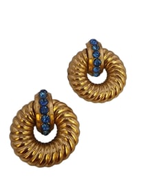 PAIR OF PATED AND RHINESTONE BROOCHES