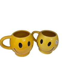 PAIR OF MCCOY SMILEY FACE COFFEE CUPS