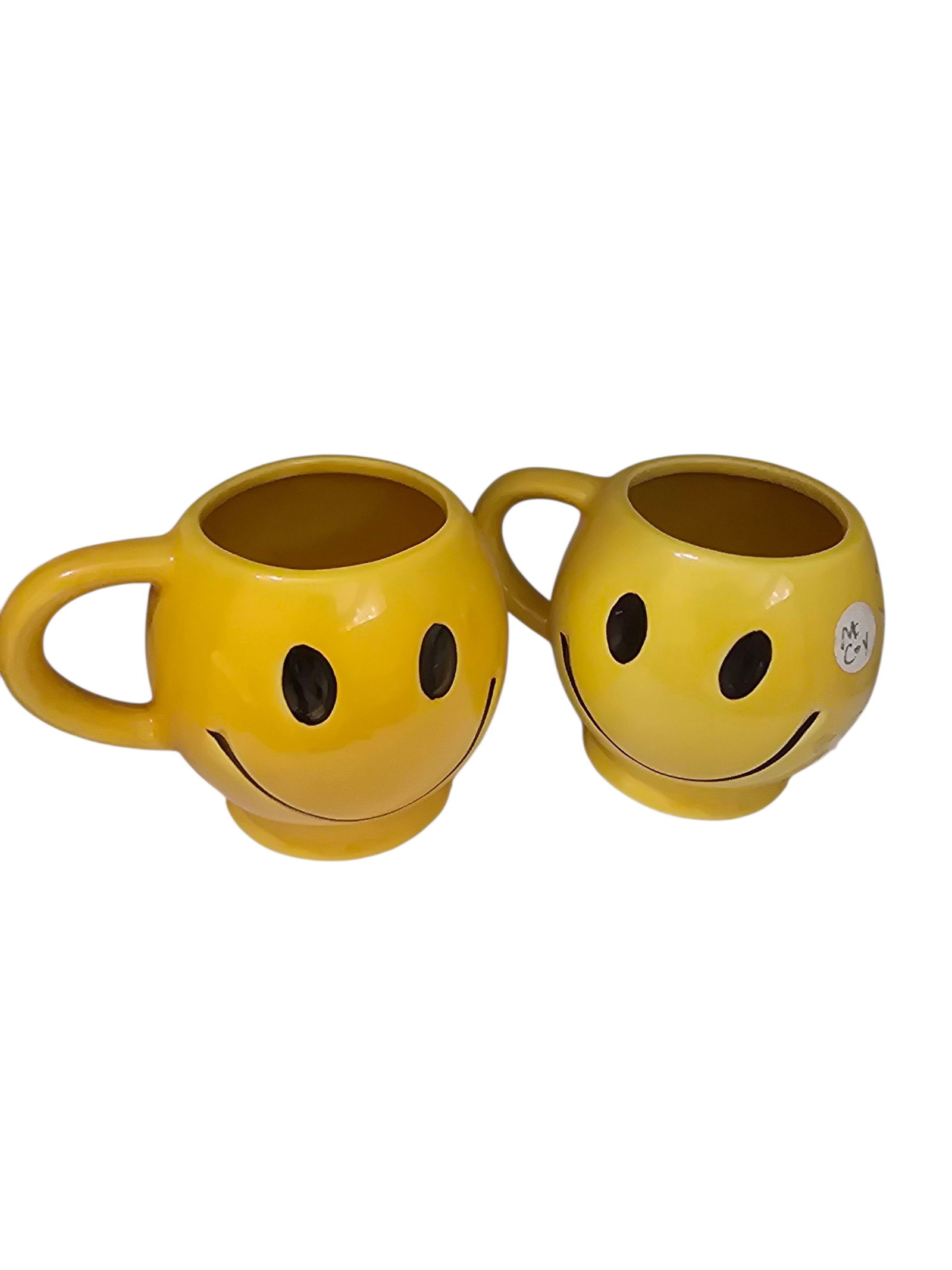 PAIR OF MCCOY SMILEY FACE COFFEE CUPS: PAIR OF MCCOY SMILEY FACE COFFEE CUPS. 4". IN GOOD CONDITION, DON’T SEE ANY REAL ISSUE OTHER THAN CLEANING