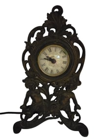ANTIQUE METAL CHERUB CLOCK WITH PATENT DATE OCT 9, 1905 HAS BEEN MODIFIED