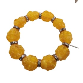 VINTAGE YELLOW RESIN BUDDHA BRACELET NOS