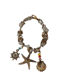 VINTAGE NOS UNSIGNED BEE CHARMING SILK CORD STAR FISH CHARM FRIENDSHIP BRACELET