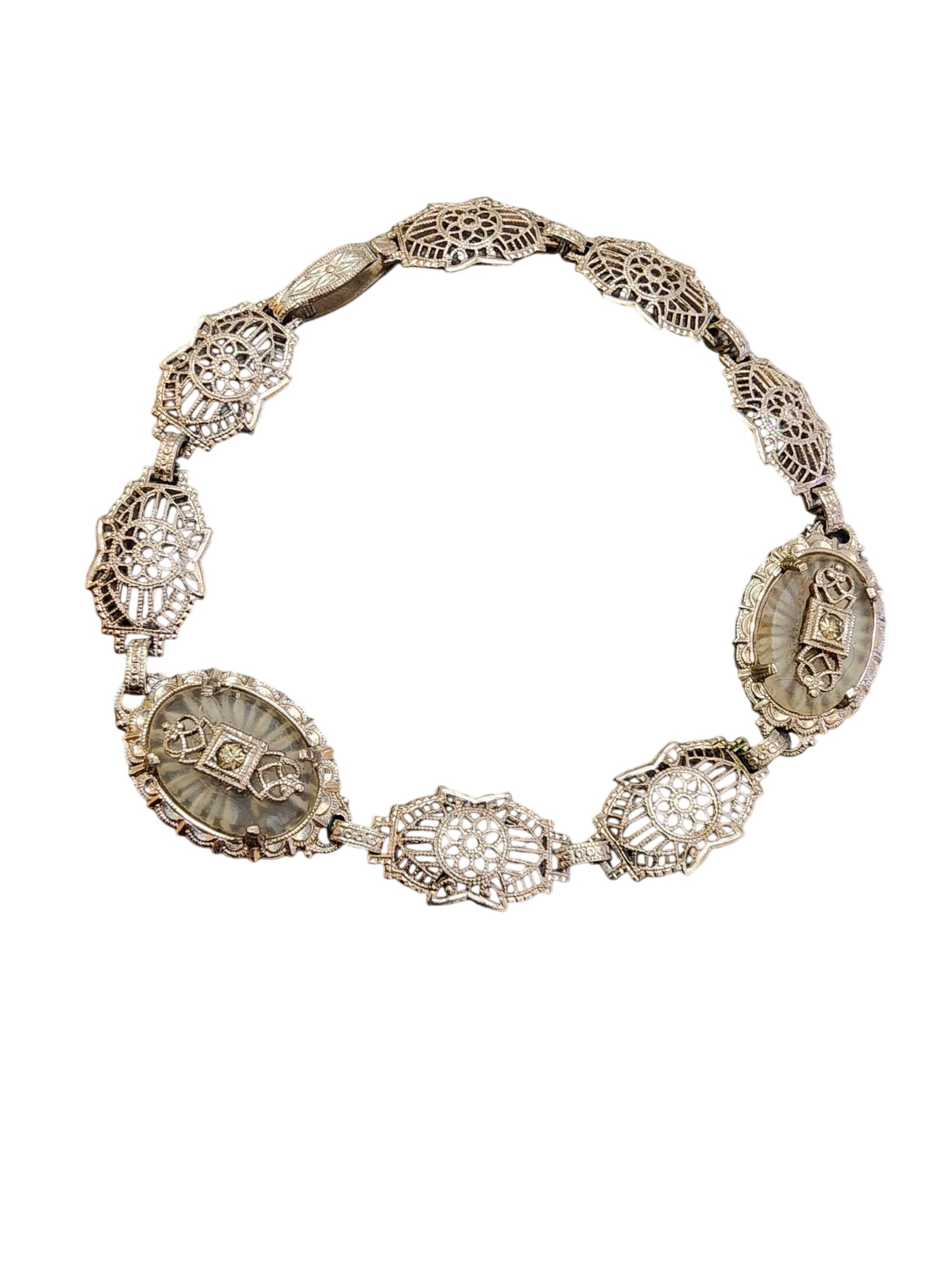 SPECTACULAR DOUBLE CAMPHOR EDWARDIAN FILIGREE BRACELET: Spectacular Double Camphor Edwardian Filigree Bracelet (A4556)Size: 7" longColor: SilverCondition: Very goodSigned: NoneDetails: Rhodium plated, unique to find camphor glass sections.The ends have 2 f