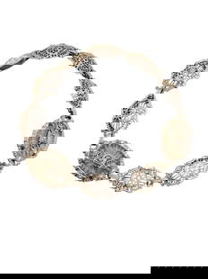 SPECTACULAR DOUBLE CAMPHOR EDWARDIAN FILIGREE BRACELET: Spectacular Double Camphor Edwardian Filigree Bracelet (A4556)Size: 7" longColor: SilverCondition: Very goodSigned: NoneDetails: Rhodium plated, unique to find camphor glass sections.The ends have 2 f